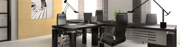 Office with a corner desk and desk chairs
