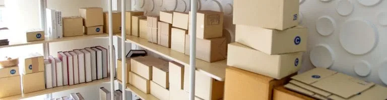 Office supplies inside of boxes, being prepared for a relocation.